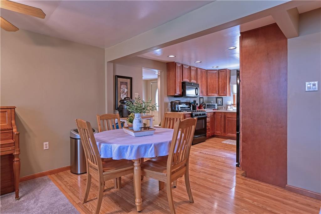 139 Miller Road Rochester, PA 15074 - Photo 5 of 33 a view of a dining room with furniture and wooden floor