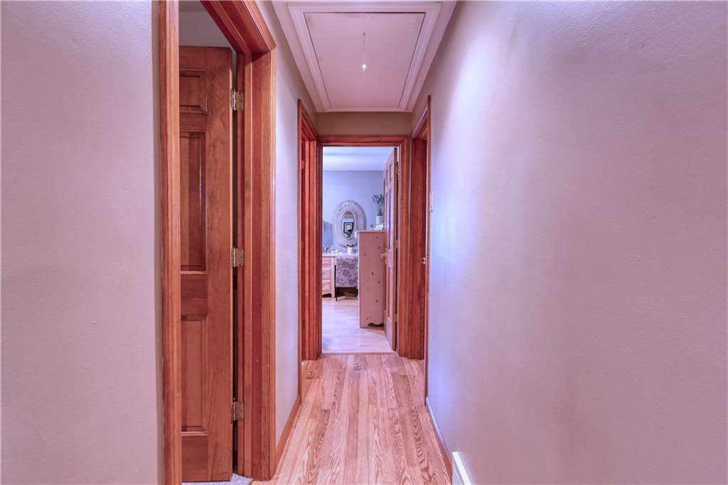 139 Miller Road Rochester, PA 15074 - Photo 8 of 33 a view of a hallway with wooden floor
