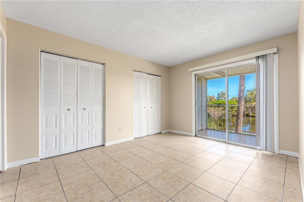 333 Southeast Martin Avenue, Unit 57 Stuart, FL 34996 - Photo 12 of 16 a view of an empty room and window