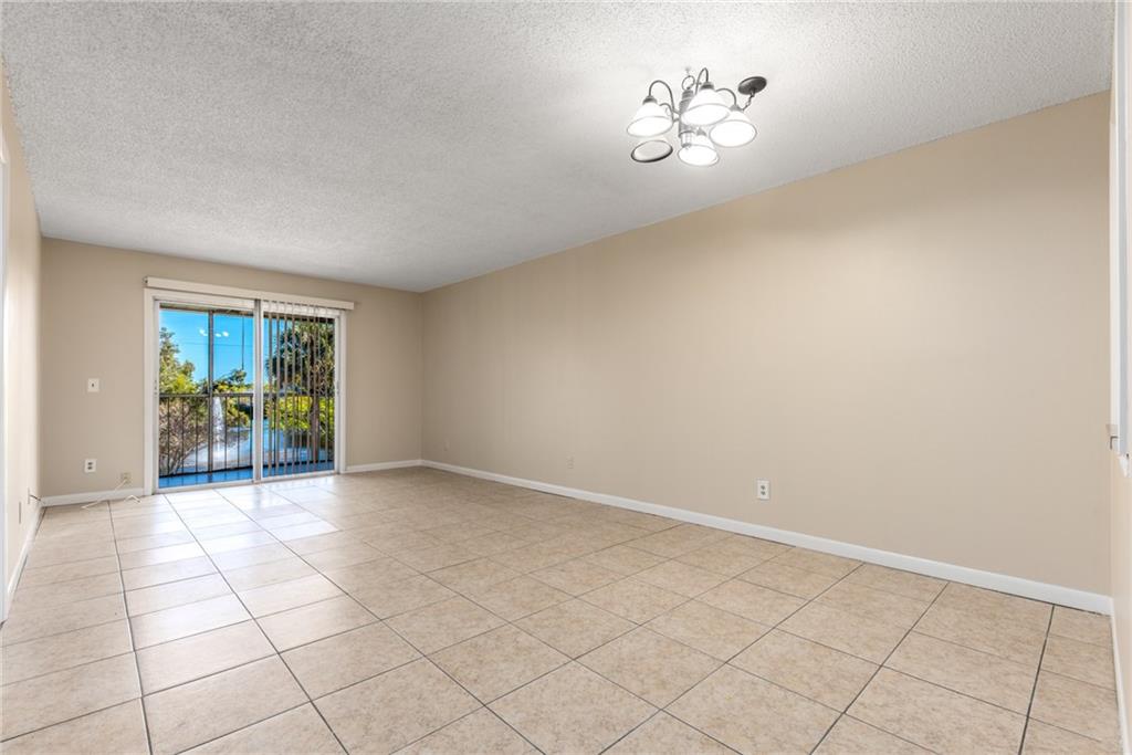 333 Southeast Martin Avenue, Unit 57 Stuart, FL 34996 - Photo 5 of 16 a view of an empty room with a window