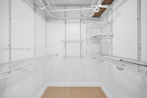 a view of a room with racks on the wall
