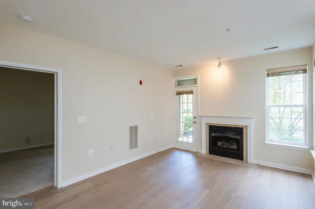 an empty room with windows