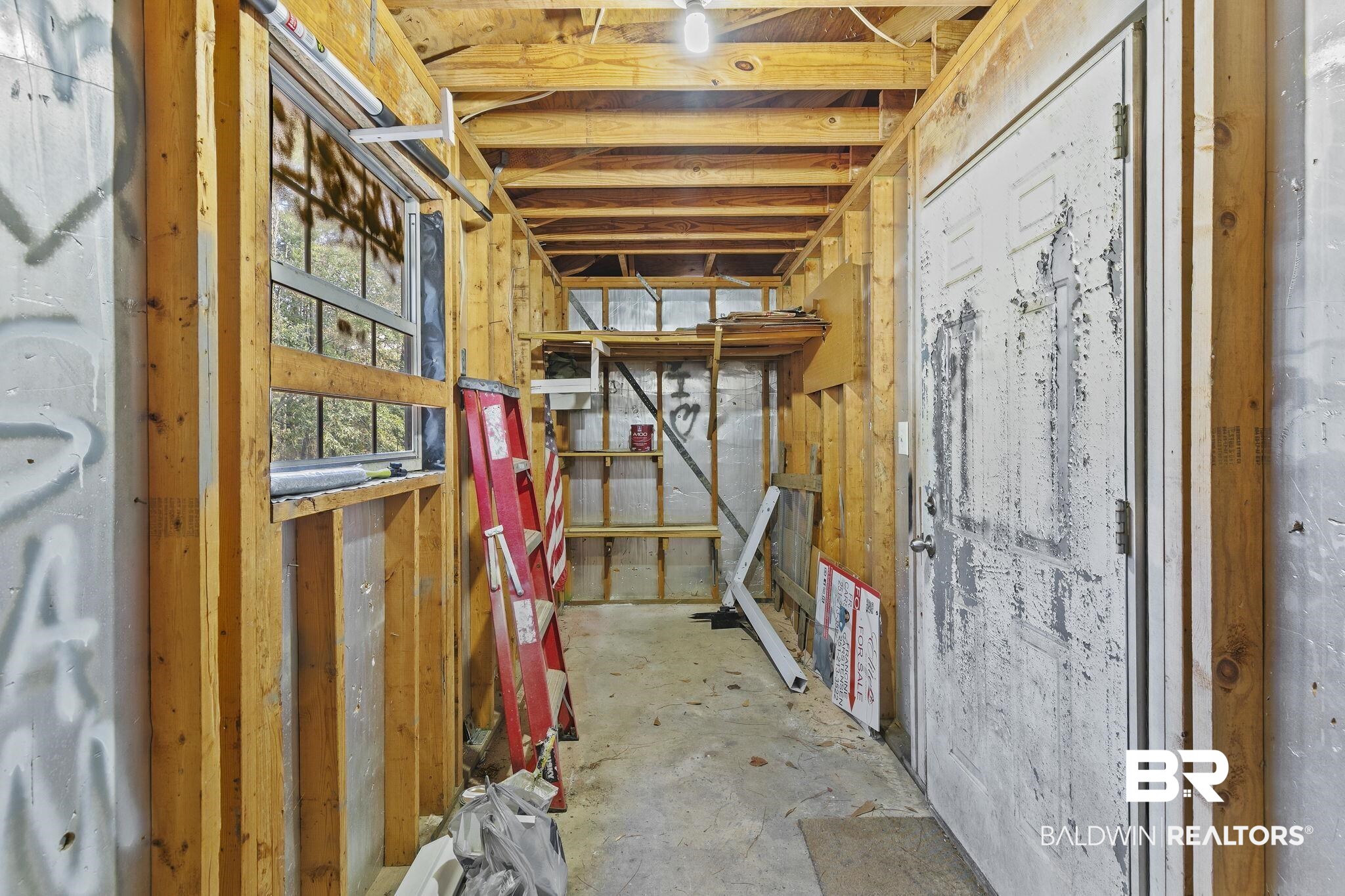 359 Ridgewood Drive Daphne, AL 36526 - Photo 51 of 73 Large storage area attached to carport