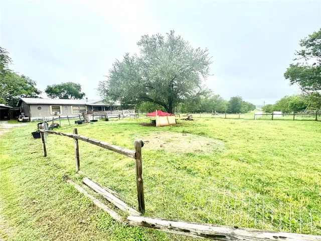 a view of an outdoor space and swimming pool