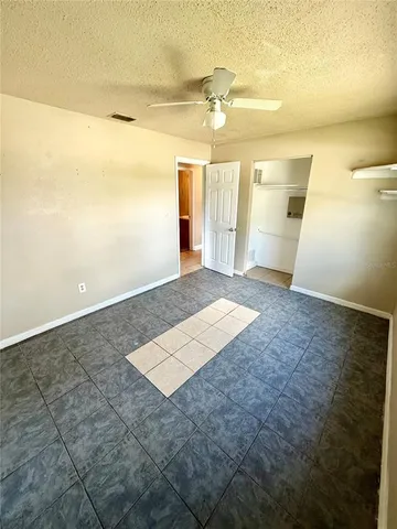 a bathroom with a toilet a sink and bathtub