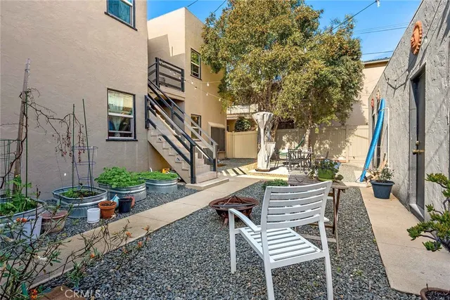 a view of a house with large windows