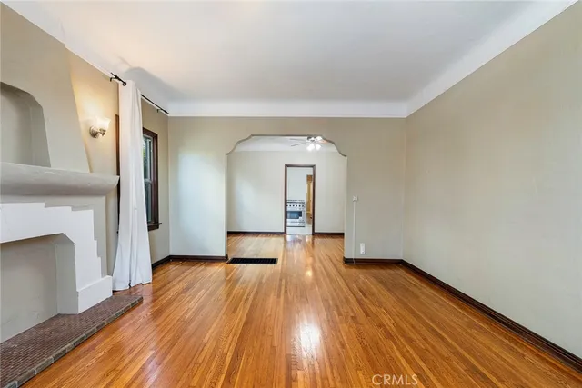 a kitchen with cabinets and white appliances