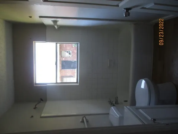 a bathroom with a sink and a toilet