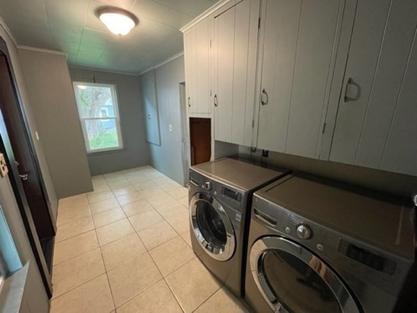 124 Wells Street Greenfield, MA 01301 - Photo 12 of 19 a view of a storage & utility room with washer and dryer