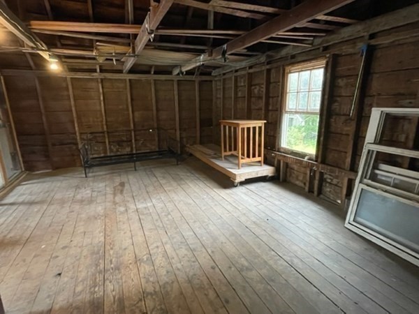 124 Wells Street Greenfield, MA 01301 - Photo 17 of 19 a view of an empty room with wooden floor
