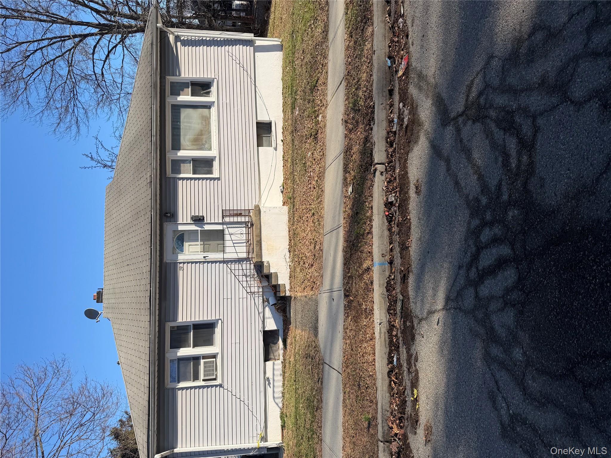 29 East Castle Avenue Spring Valley, NY 10977 - Photo 1 of 2 a view of a house with a yard