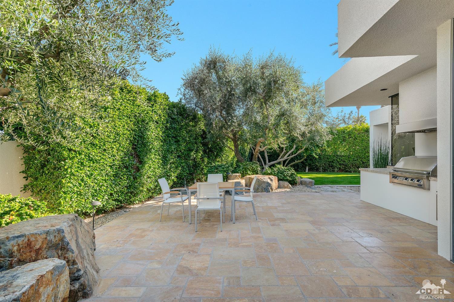 31 Sun Ridge Circle Rancho Mirage, CA 92270 - Photo 40 of 45 a view of a backyard with a sitting area