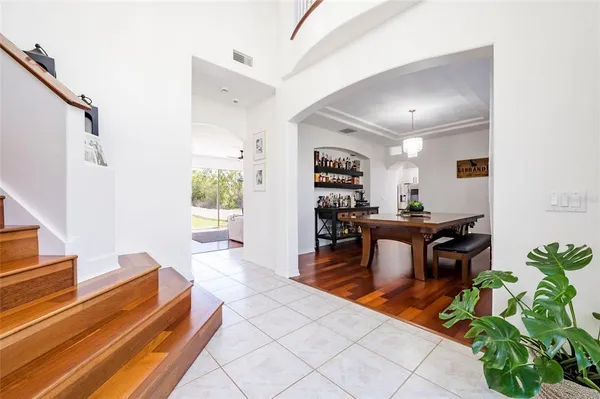 a kitchen with a sink stove and microwave