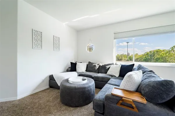 a view of a lake with a house in the background