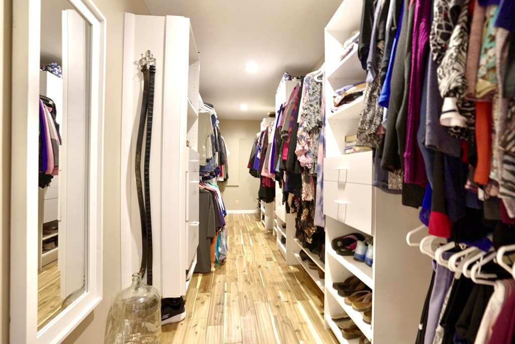386 County Road 181 Decatur, TN 37322 - Photo 62 of 70 a view of walk in closet with clothes and shoes