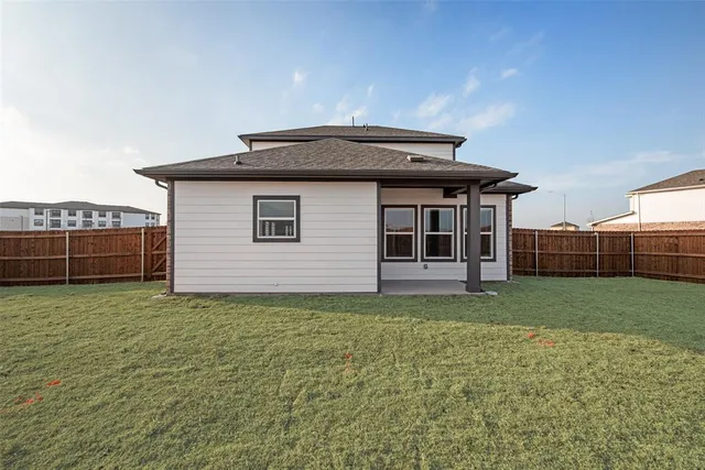 a house view with a garden space