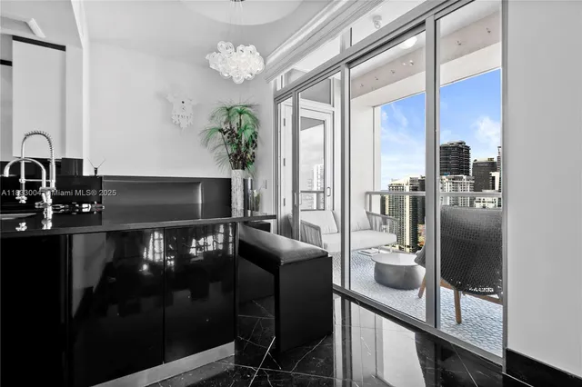 a kitchen with a refrigerator a sink and cabinets