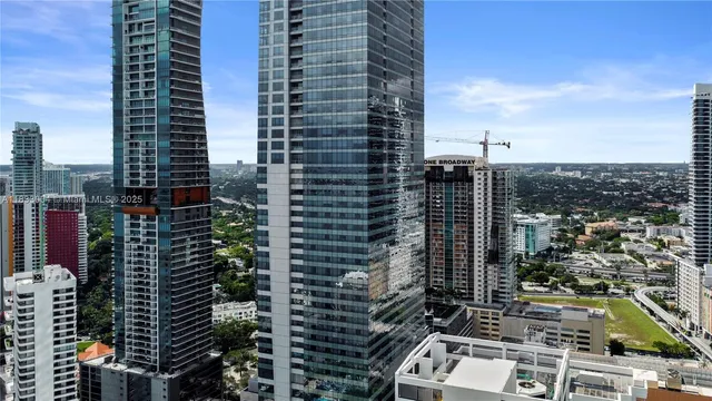 a view of a city with tall buildings