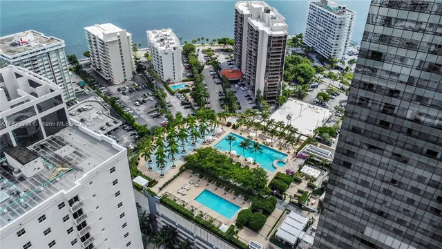 a view of a brick building with many windows