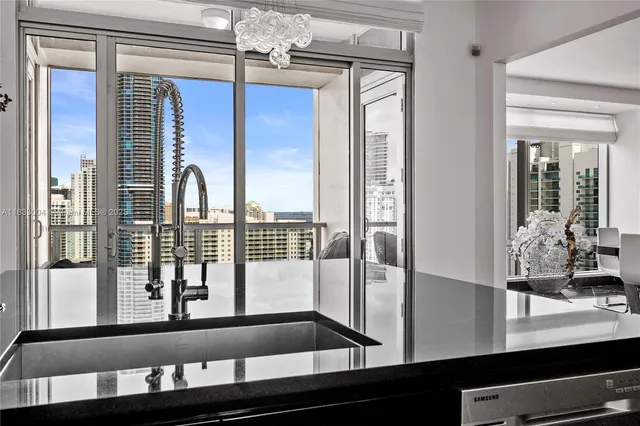 a view of a balcony with a potted plant