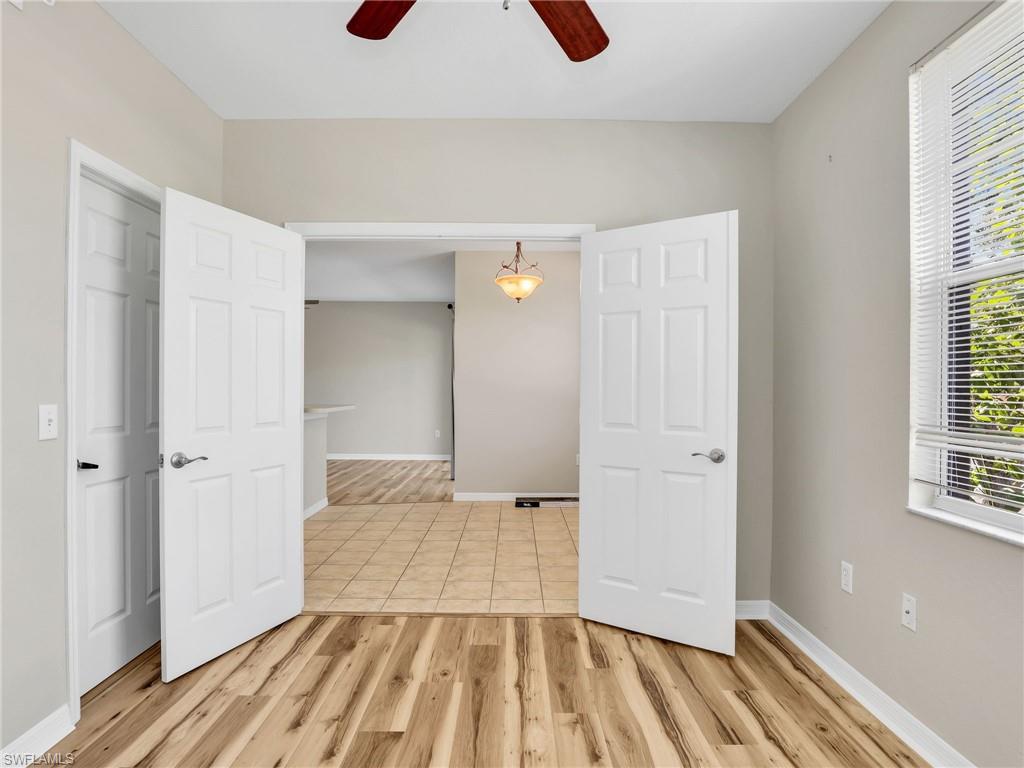 7935 Preserve Circle, Unit 423 Naples, FL 34119 - Photo 19 of 30 a view of wooden floor in a room