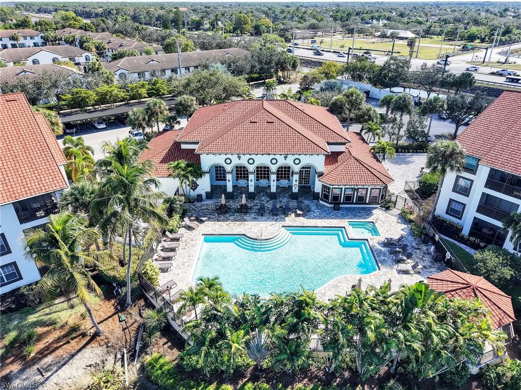 7935 Preserve Circle, Unit 423 Naples, FL 34119 - Photo 21 of 30 an aerial view of a house with yard swimming pool and outdoor seating
