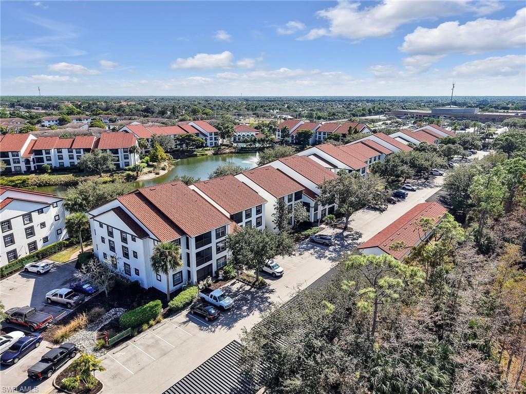 7935 Preserve Circle, Unit 423 Naples, FL 34119 - Photo 23 of 30 an aerial view of multiple house