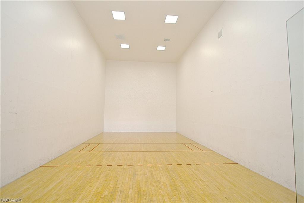 7935 Preserve Circle, Unit 423 Naples, FL 34119 - Photo 28 of 30 a view of hallway with a window