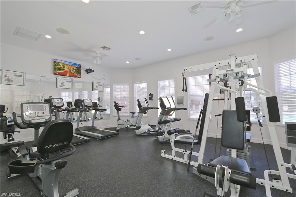 7935 Preserve Circle, Unit 423 Naples, FL 34119 - Photo 29 of 30 a view of a room with gym equipment