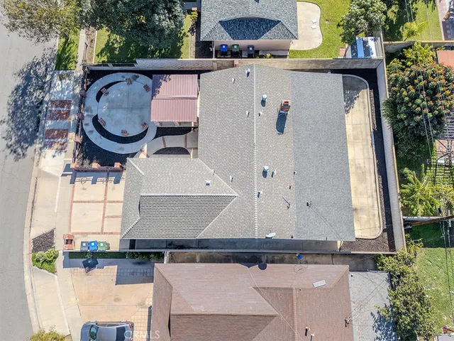 a view of a small house with roof