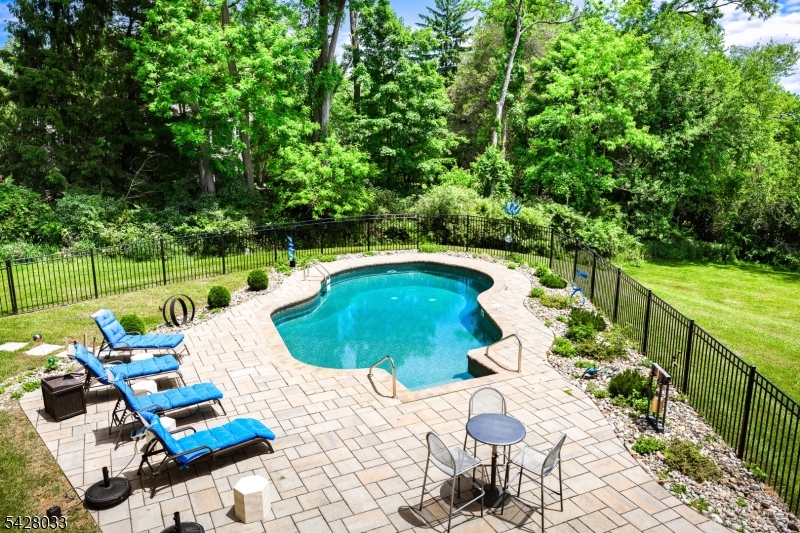 2 Chilton Road Chester, NJ 07930 - Photo 43 of 43 a view of swimming pool with lounge chair and garden