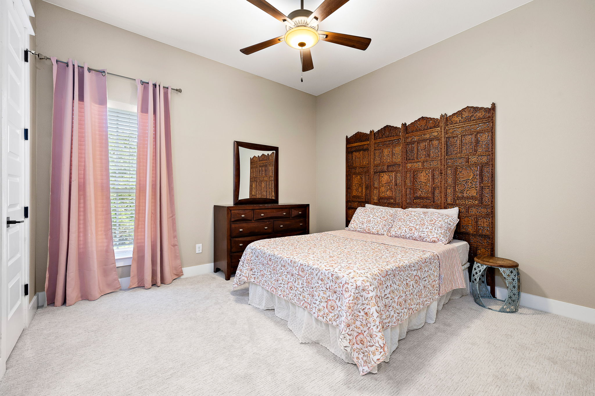 117 Covington Cove Georgetown, TX 78628 - Photo 22 of 40 Bedroom featuring light carpet and a ceiling fan