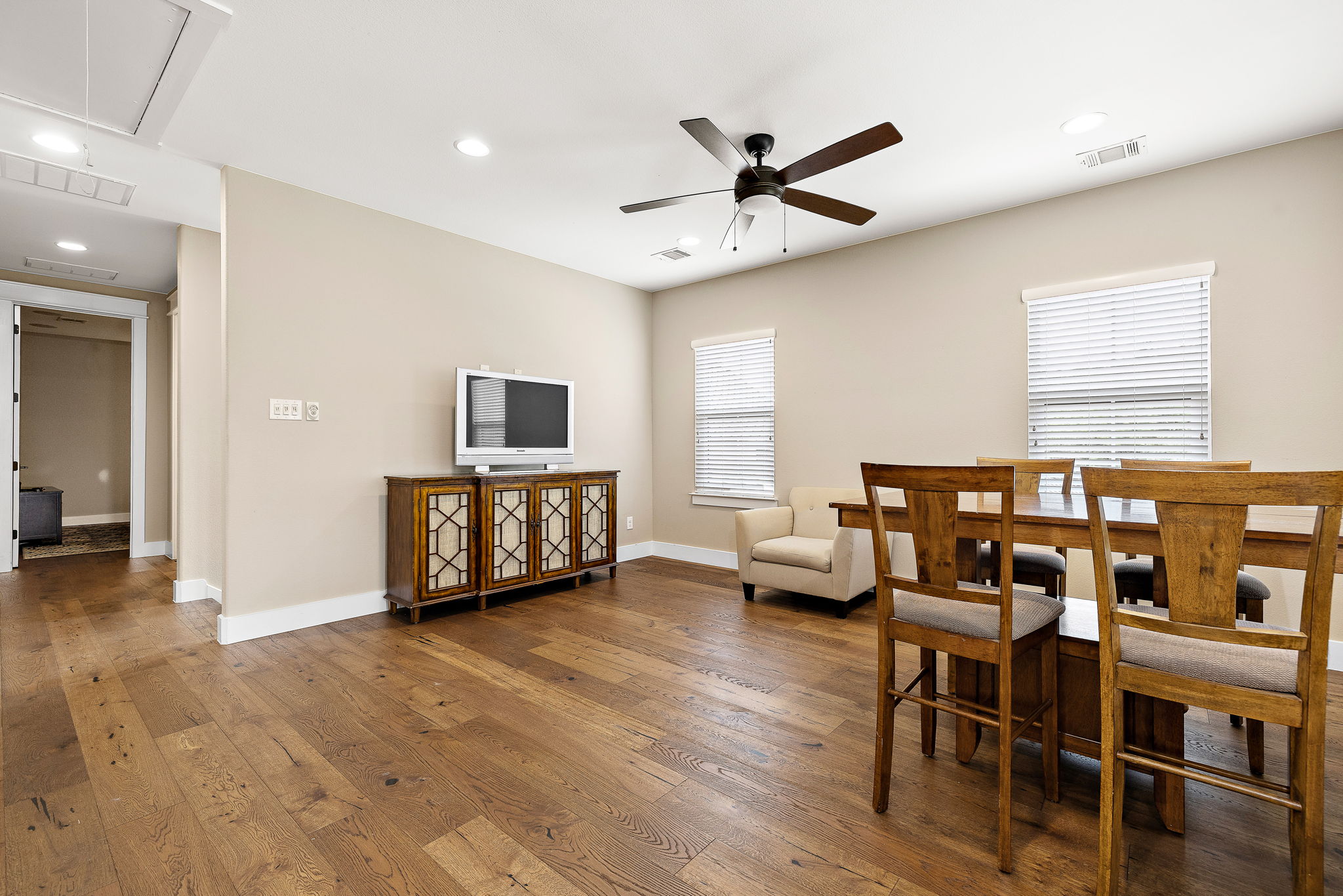117 Covington Cove Georgetown, TX 78628 - Photo 30 of 40 Dining room with attic access, hardwood / wood-style flooring, a ceiling fan, and recessed lighting