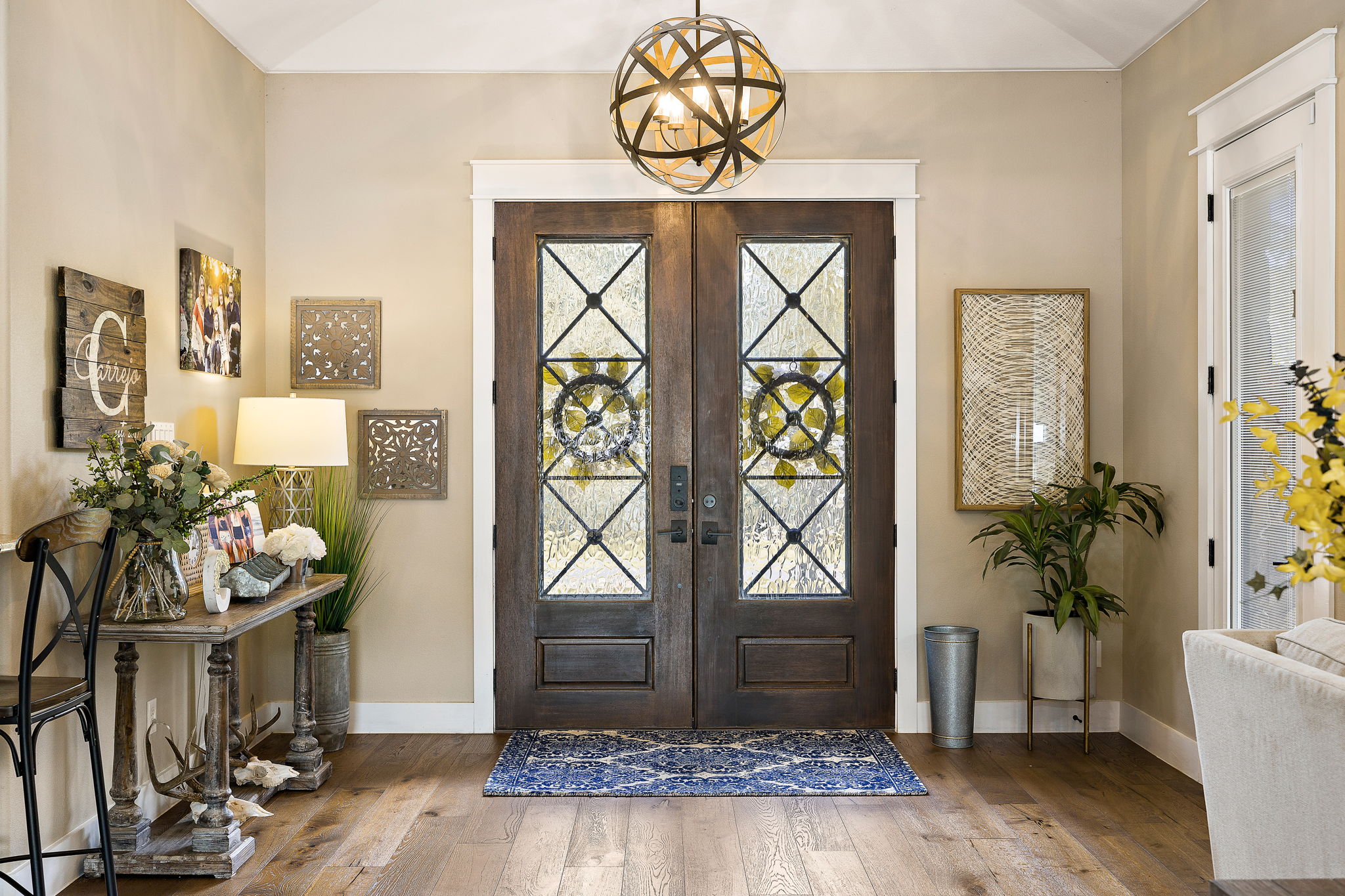 117 Covington Cove Georgetown, TX 78628 - Photo 9 of 40 Foyer with french doors, hardwood / wood-style floors, and a chandelier