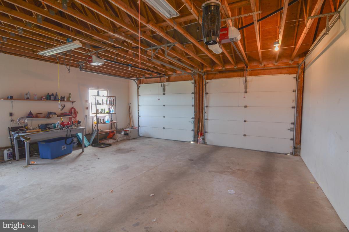 6930 Slaughter Beach Road Milford, DE 19963 - Photo 13 of 19 Large garage, plenty of storage!
