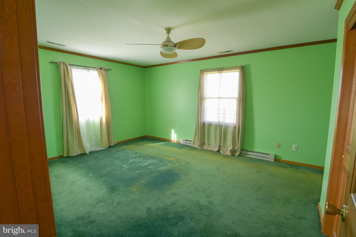 6930 Slaughter Beach Road Milford, DE 19963 - Photo 9 of 19 Large bedroom.
