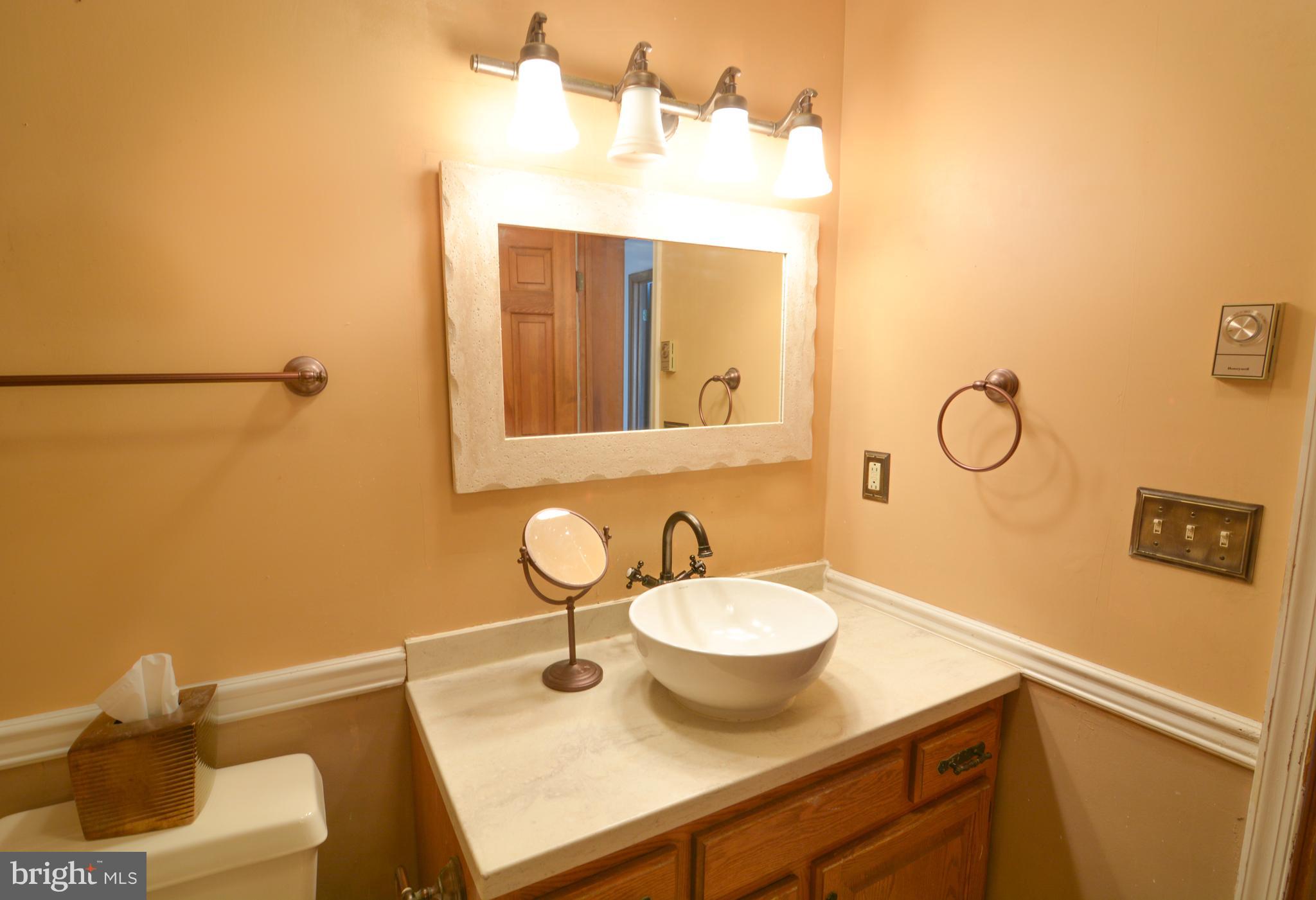 6930 Slaughter Beach Road Milford, DE 19963 - Photo 10 of 19 Partially renovated bath.