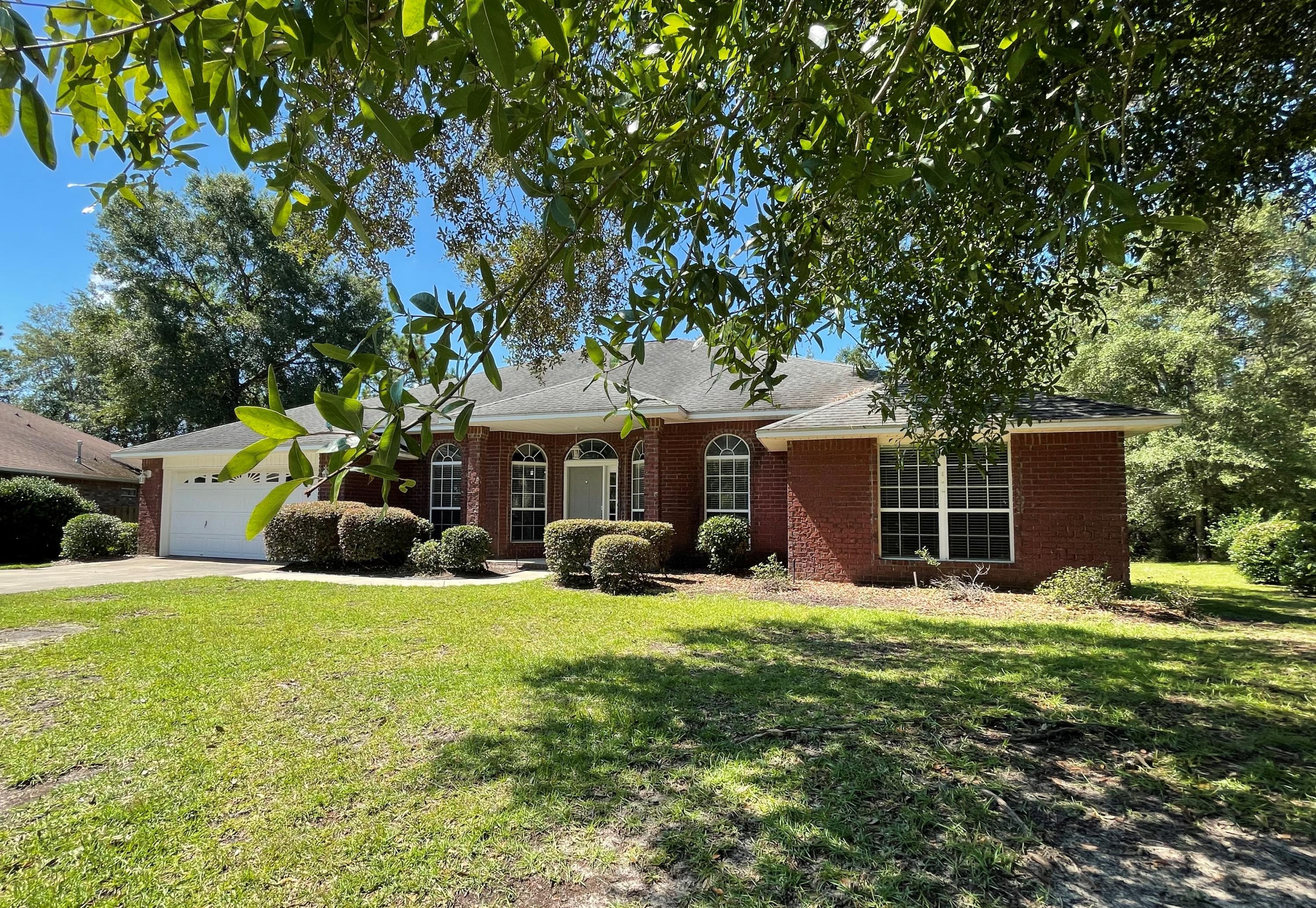 711 Fennec Fox Preserve Crestview, FL 32536 - Photo 1 of 33 a view of a house with a yard and sitting area