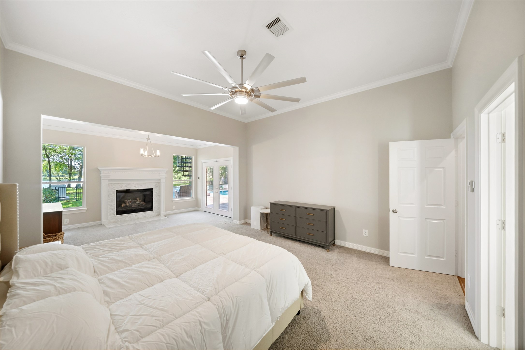 2302 Legends Shore Drive Spring, TX 77386 - Photo 30 of 49 Spacious primary retreat with soaring ceilings and a peaceful atmosphere.