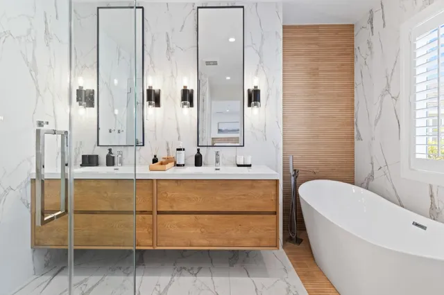 a bathroom with a bathtub and a sink