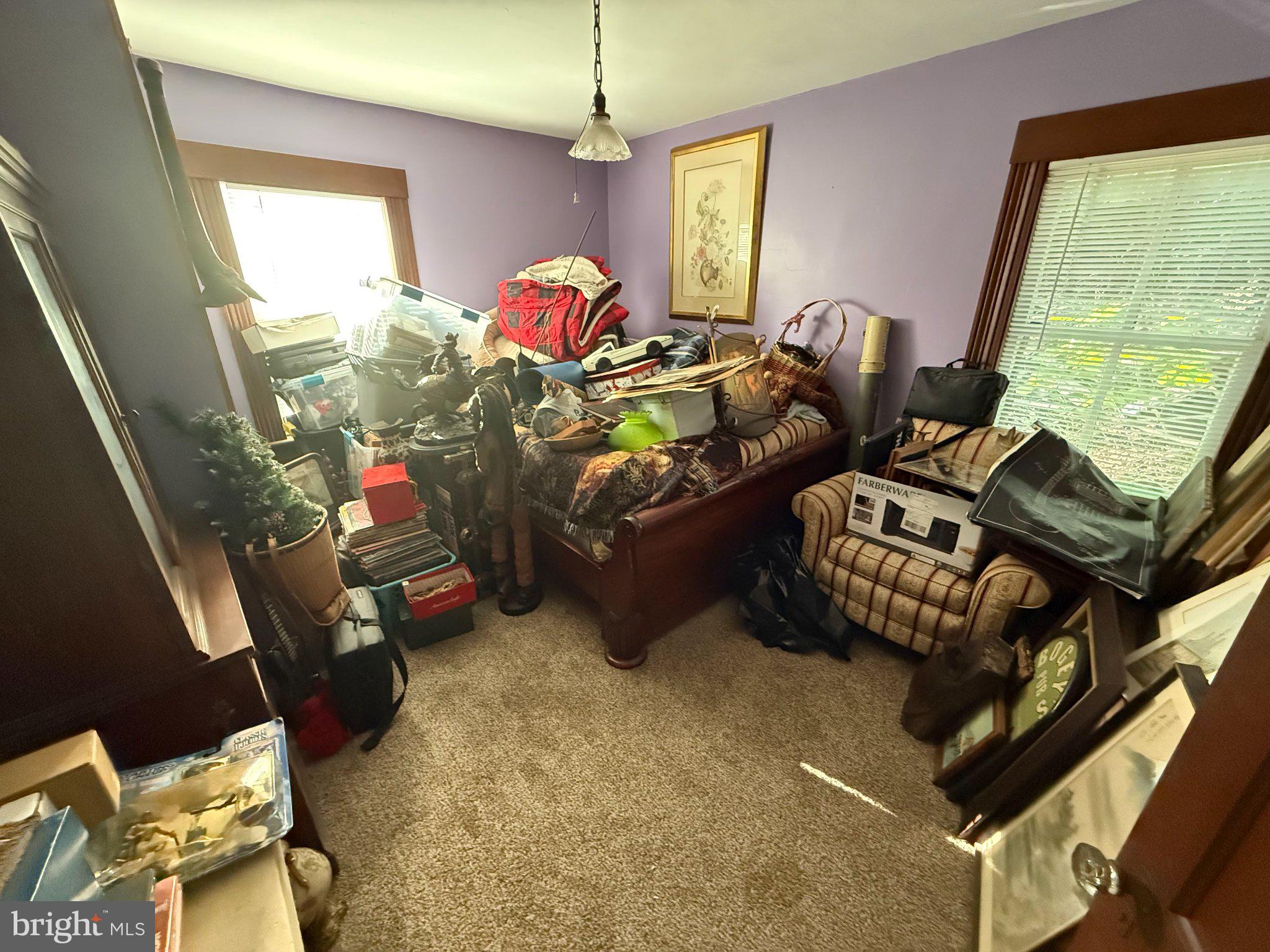 87 Milanville Road Beach Lake, PA 18405 - Photo 61 of 63 Cluttered retreat with purple walls.