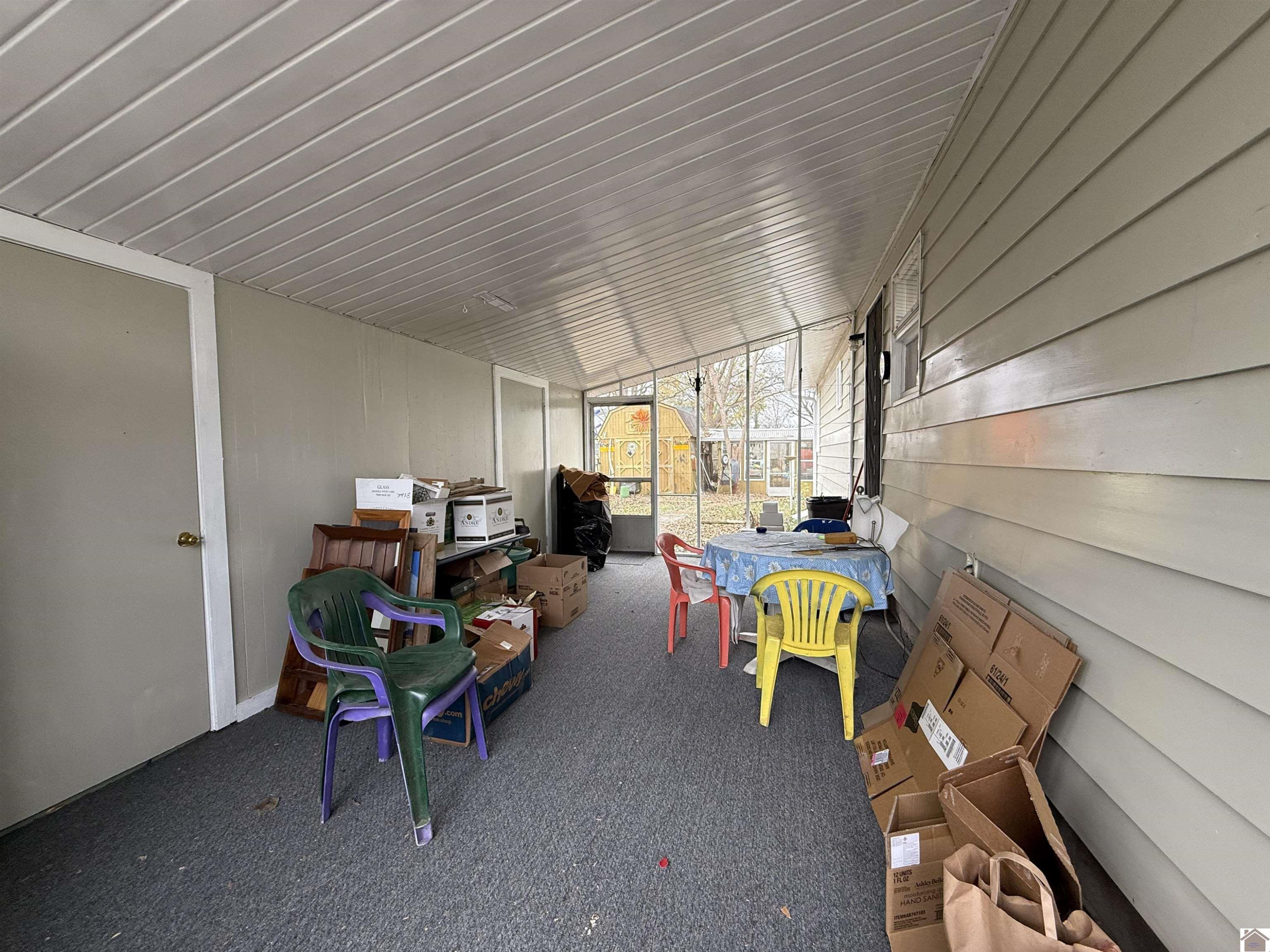 600 3rd Street Hazel, KY 42049 - Photo 20 of 28 Screened-In Room