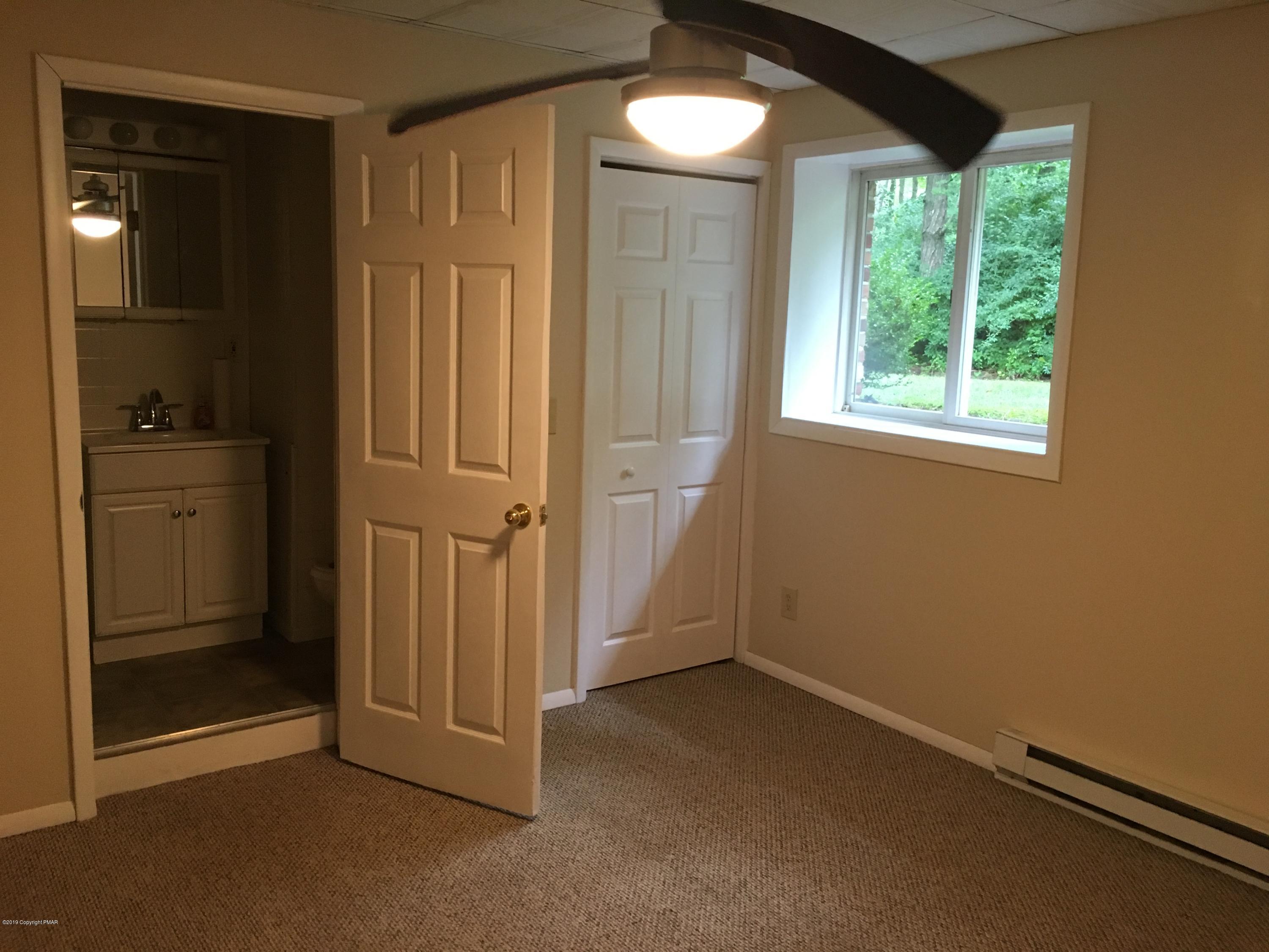 668 Cherry Lane Road East Stroudsburg, PA 18301 - Photo 15 of 28 an empty room with windows