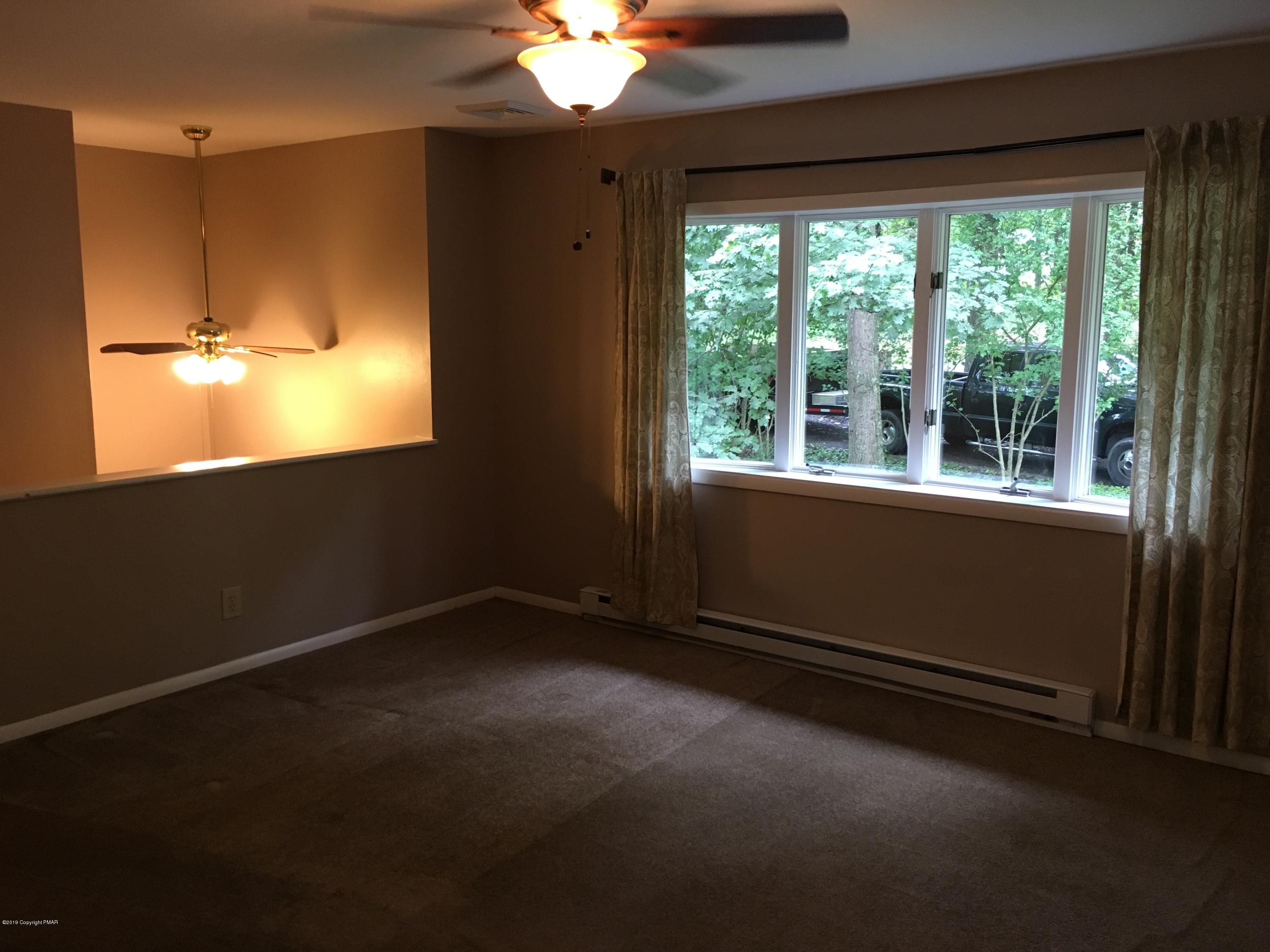668 Cherry Lane Road East Stroudsburg, PA 18301 - Photo 16 of 28 a view of an empty room with a window