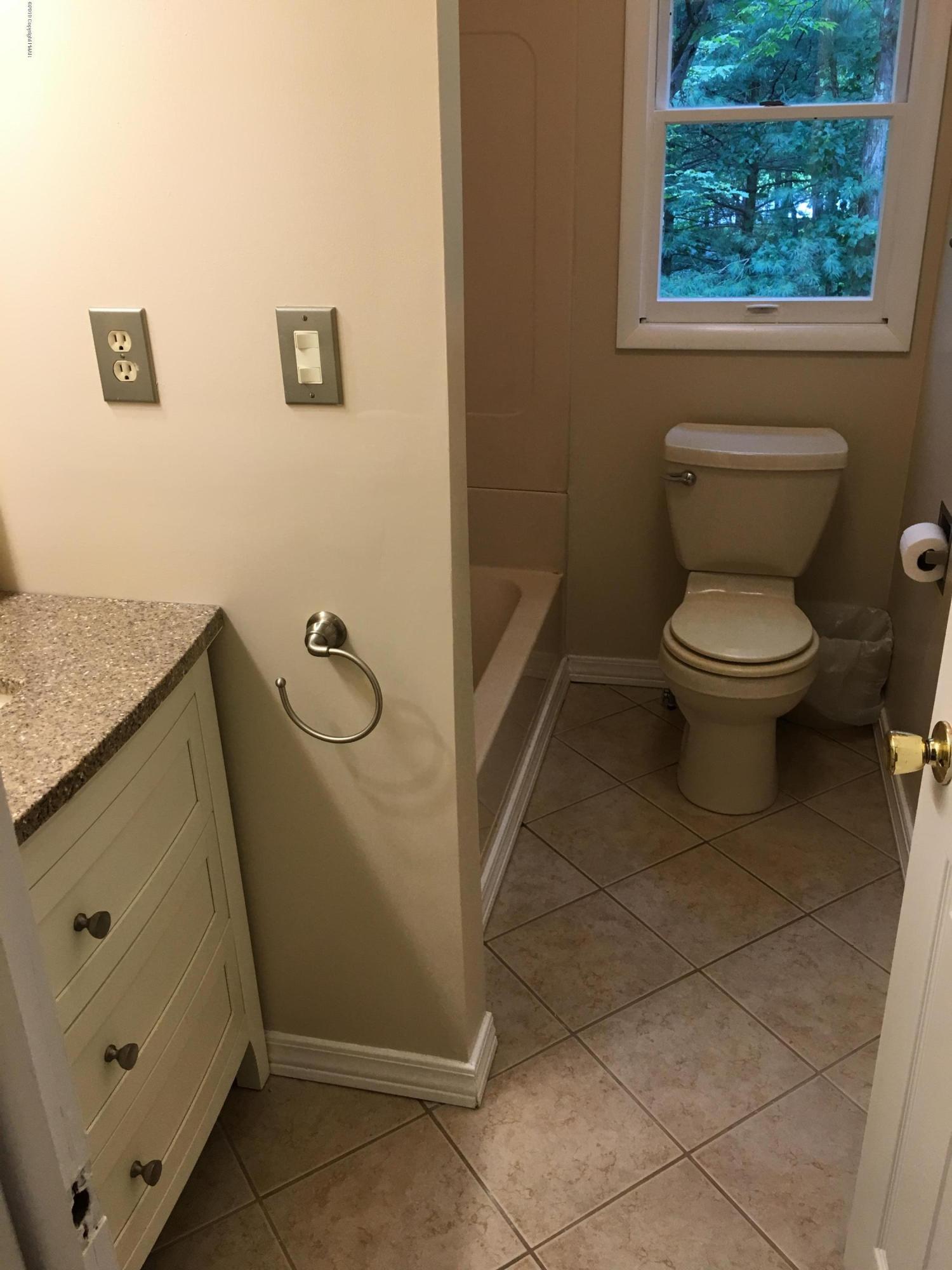668 Cherry Lane Road East Stroudsburg, PA 18301 - Photo 26 of 28 a bathroom with a toilet and a shower