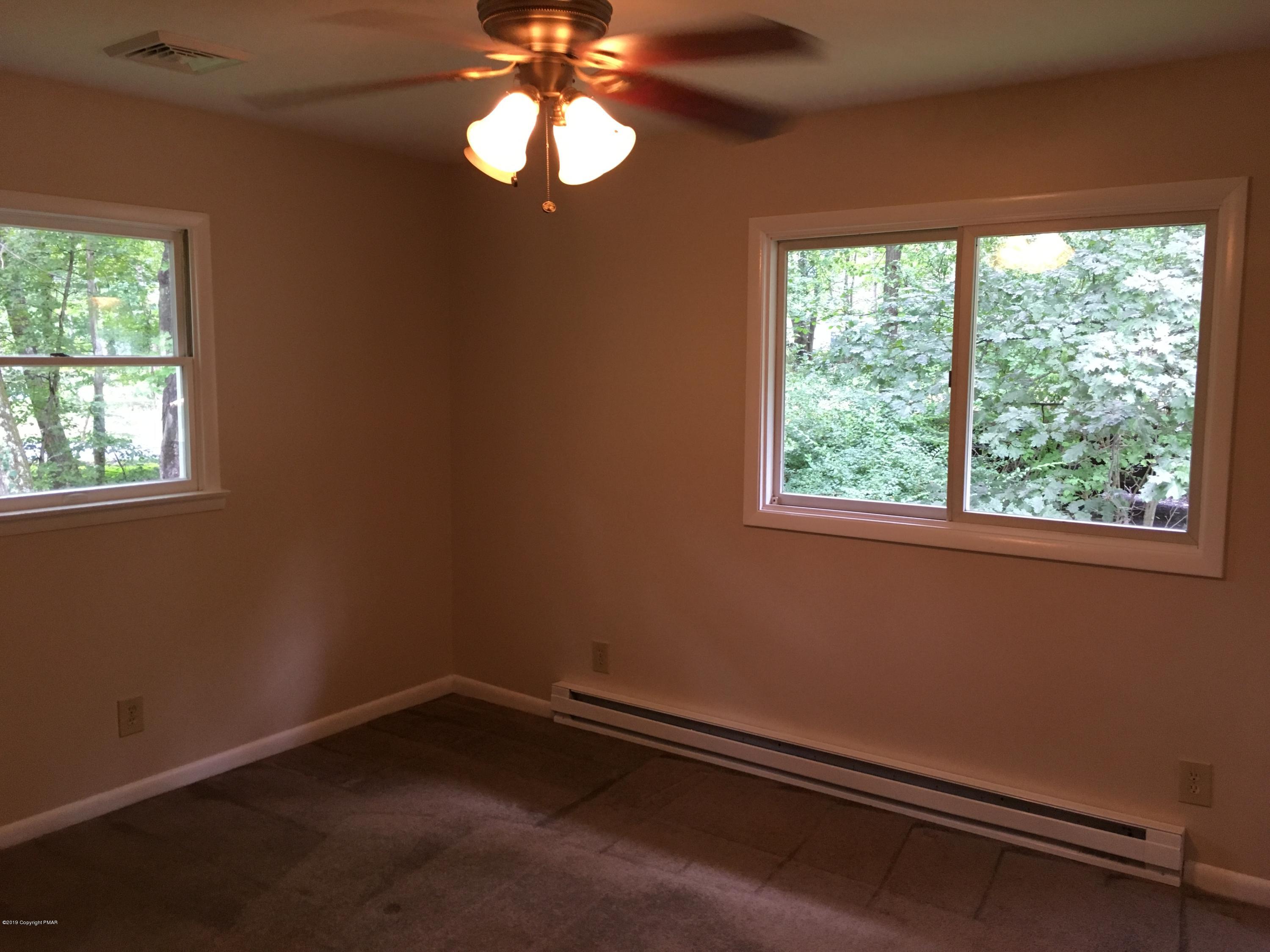 668 Cherry Lane Road East Stroudsburg, PA 18301 - Photo 27 of 28 a view of room with window and ceiling fan
