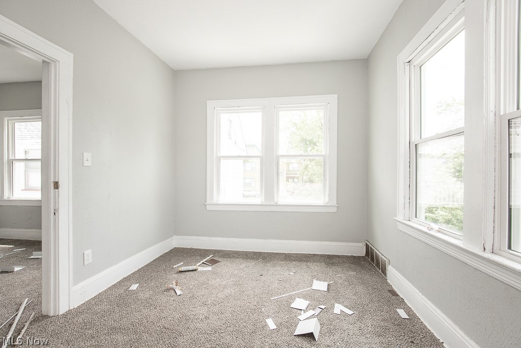 1000 Eddy Road Cleveland, OH 44108 - Photo 37 of 38 Empty room featuring baseboards and carpet