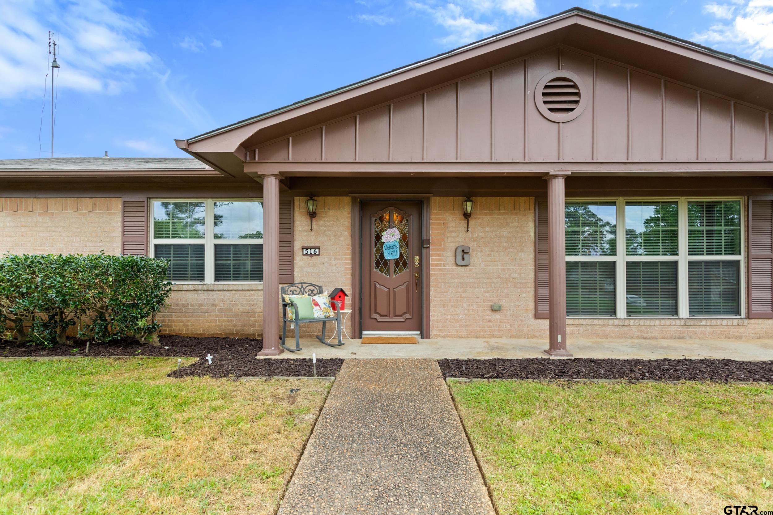 516 Ruthlynn Drive Longview, TX 75605 - Photo 2 of 34 a front view of a house with garden