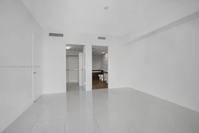 a bathroom with a sink a mirror and a bathtub