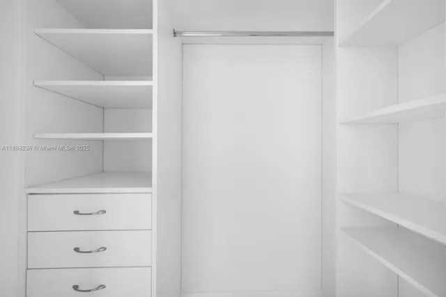 a view of a city with tall buildings